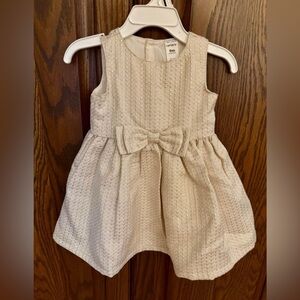 Carter’s gold dress